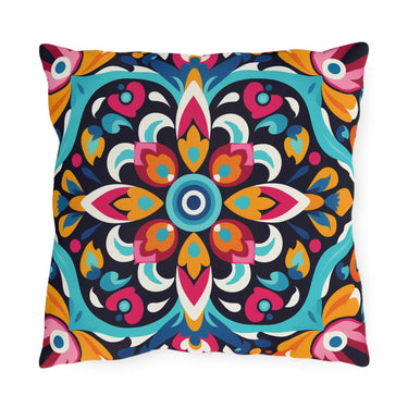Colorful mandala patterned pillow on a white background